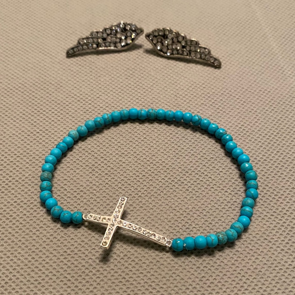 Angel wings earrings and cross rhinestone bracelet